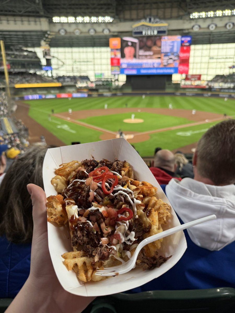 SamDikanovic's tweet photo. First #AmFamFood of the year. BBQ Brisket Fries and Fried Kringle to start the new season. @BREWERS WIN https://t.co/jrLYqyOt7W