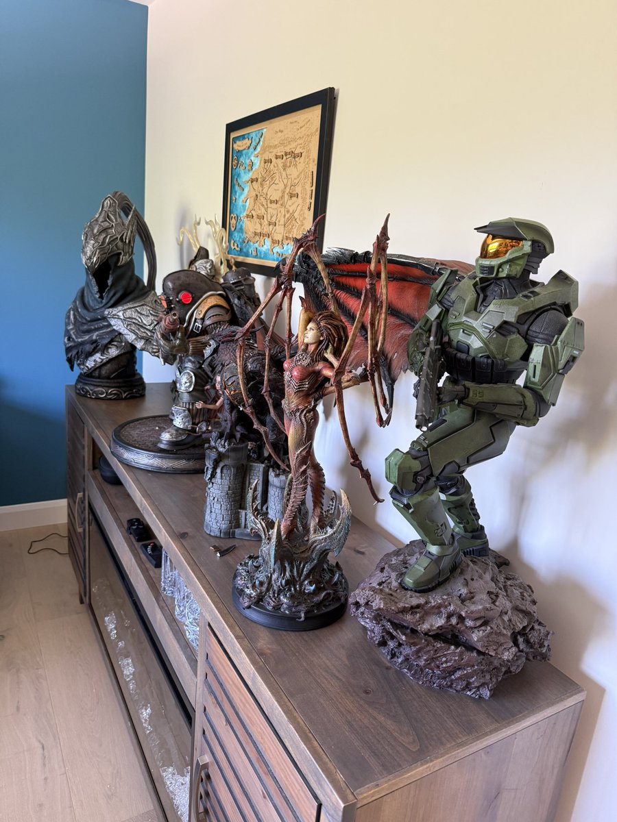I’ve been working on my office nerd shelf all weekend! Has all my favorite franchises: Dark Souls, Diablo, Halo, World of Warcraft, and Bioshock.