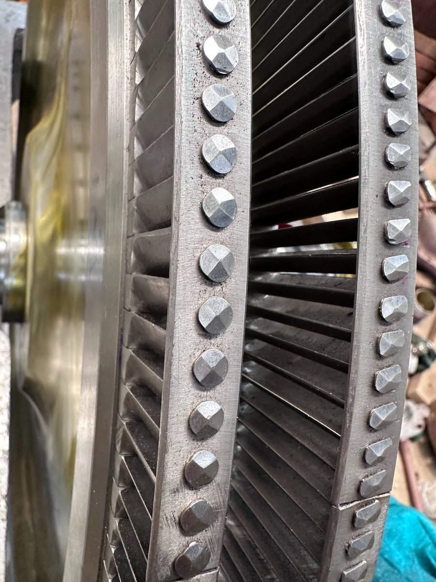 nsterbogroup's tweet image. Manual work. Precision finish.
Turbine blades rivetted with utmost accuracy by experienced hands — because in critical components, skill makes the difference.
#SteamTurbine #TurbineBlades #Riveting #PrecisionEngineering #SkilledWork #NSterbo
