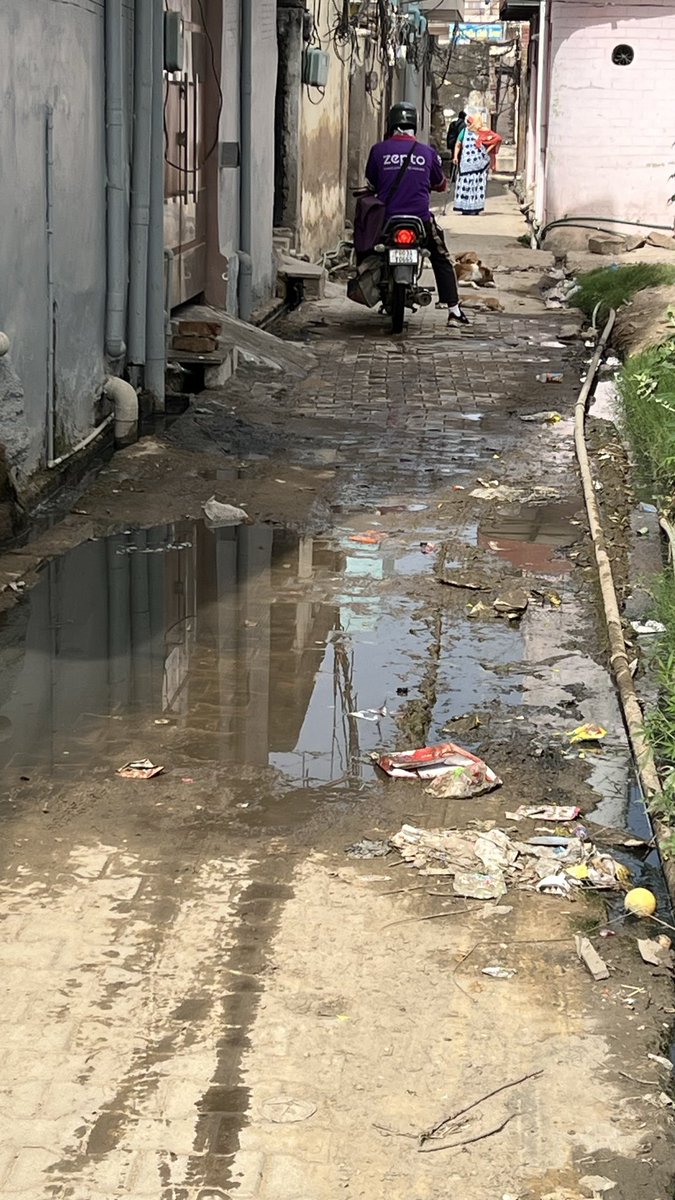 advdikshant's tweet photo. Disgraceful condition in front of Neeraj Primary School, Manesar and Near by Area &amp; Streets. Broken gutters, waterlogging, and garbage piles. Health risk to hundreds of students. Requesting urgent action. @MCManesar @DC_Gurugram @cmohry @IAS_Pradeep_001 https://t.co/L22lQW9pcx