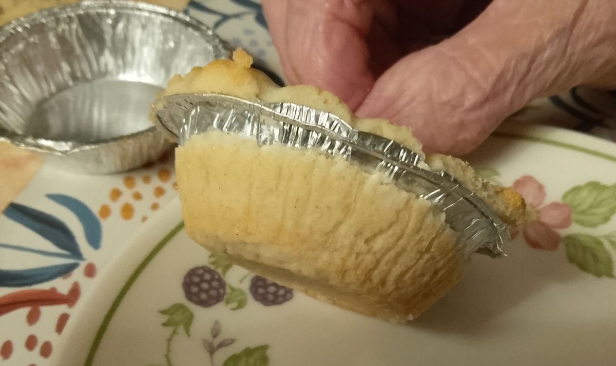 luvf196's tweet photo. @sainsburys Very disappointed with your apple pies which were being shared out for a family meal. As you can see in the picture, the pastry was on the outside of the foil, it was rock hard and there was no apple within it. https://t.co/D6Y4IWXOs4