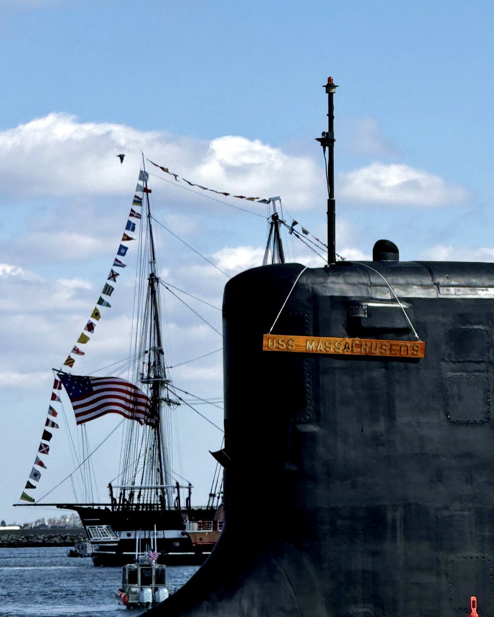 BlueWaterShips's tweet photo. On Saturday, the Blue Water team had the honor of witnessing the commissioning of the newest Virginia-class fast attack submarine, USS Massachusetts (SSN 798), in Boston Harbor.

One moment that stood out: the USS Constitution—the Navy’s oldest commissioned warship—passing behind the submarine and rendering honors with a cannon salute. A powerful reminder of the depth of our naval tradition, especially in a year celebrating the 250th anniversary of our nation.

Being part of this legacy was humbling. Touring one of the most advanced submarines in the world made it even more unforgettable.

Proud to support this milestone—and the “Wicked Stealth” of our Navy’s submarine force.

Hooyah! 

#Massachusetts #Navy #Shipbuilding