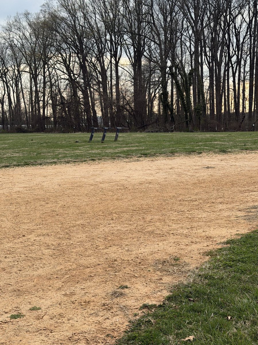 cdew29's tweet photo. Same school.  Different field.  Kinda hard to catch fly balls with this thing in center field.  
You guys should have someone from your offices come look at these fields.  It’s sad.  Bring the @BaltCoRec director with you. I bet their kids wouldn’t have to play on such places https://t.co/L49ylWPJaS