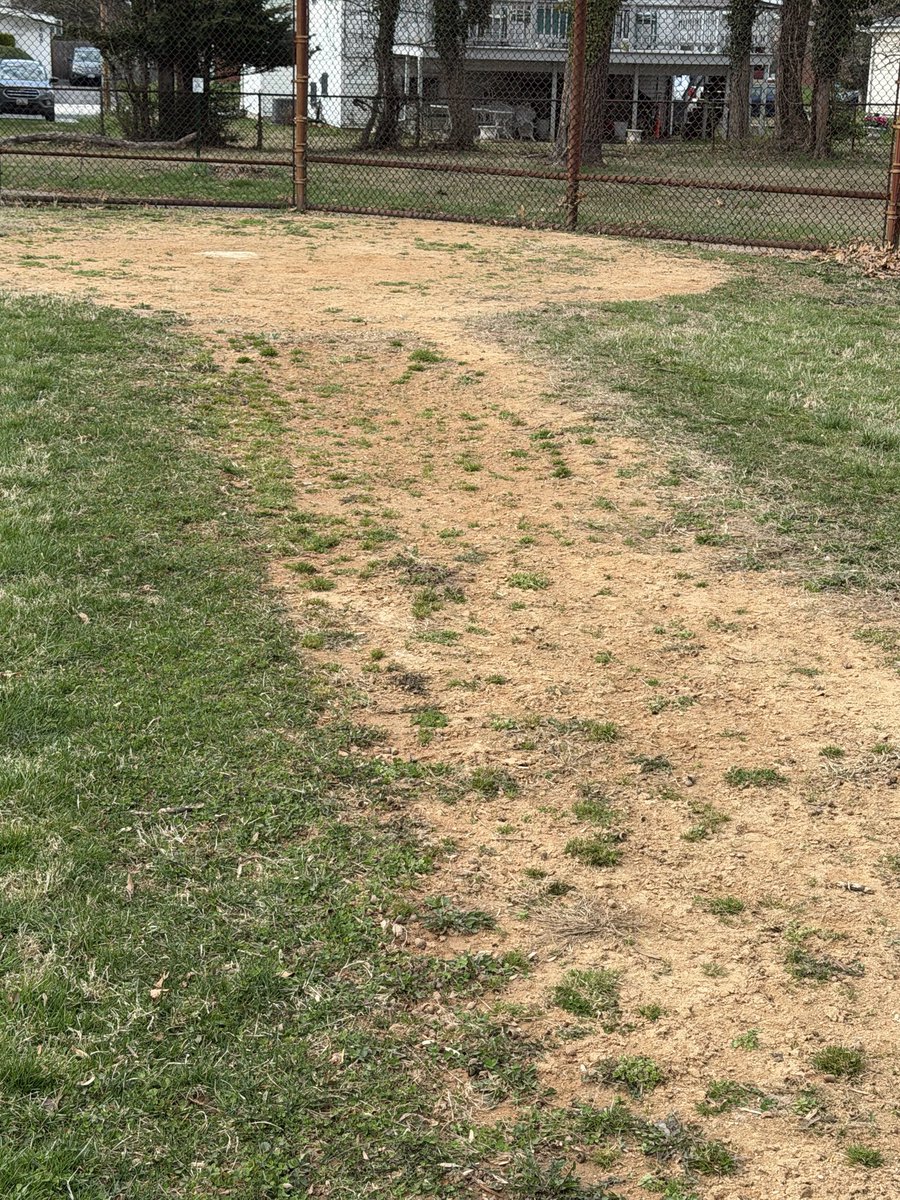 cdew29's tweet photo. Same school.  Different field.  Kinda hard to catch fly balls with this thing in center field.  
You guys should have someone from your offices come look at these fields.  It’s sad.  Bring the @BaltCoRec director with you. I bet their kids wouldn’t have to play on such places https://t.co/L49ylWPJaS