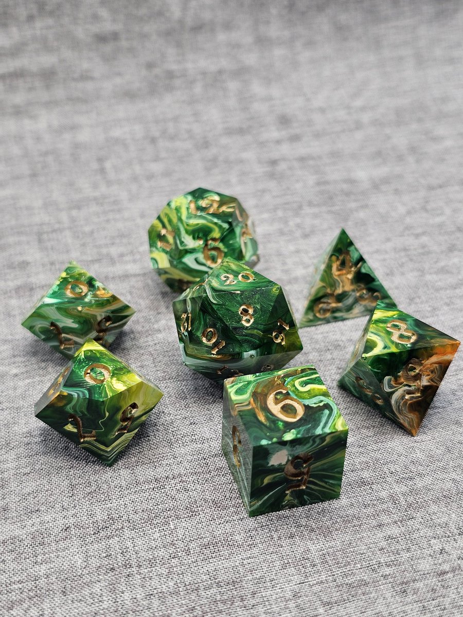 blackdragondice's tweet photo. Thought it would be fun to showcase some of the dice in my personal collection!

Custom dice orders are still open!  If you've always wanted a dice set custom-made for your D&amp;D character, (or just because you had a fun idea in mind), message me today!

#dnd #fyp #dicemaking #art https://t.co/aKPFop4XLP