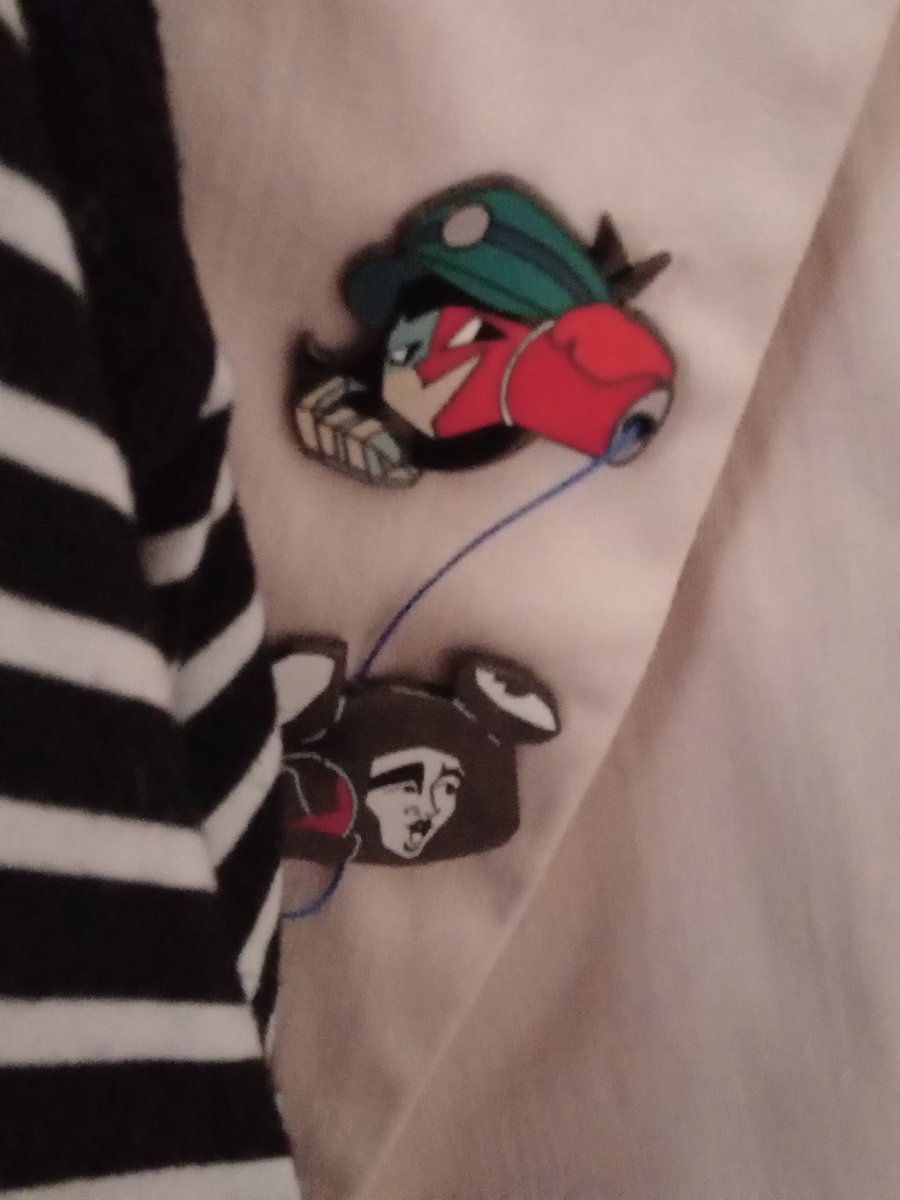 A lady noticed these pins on my suit jacket earlier, and she excitedly remarked to me: "I see you love the Muppets!"