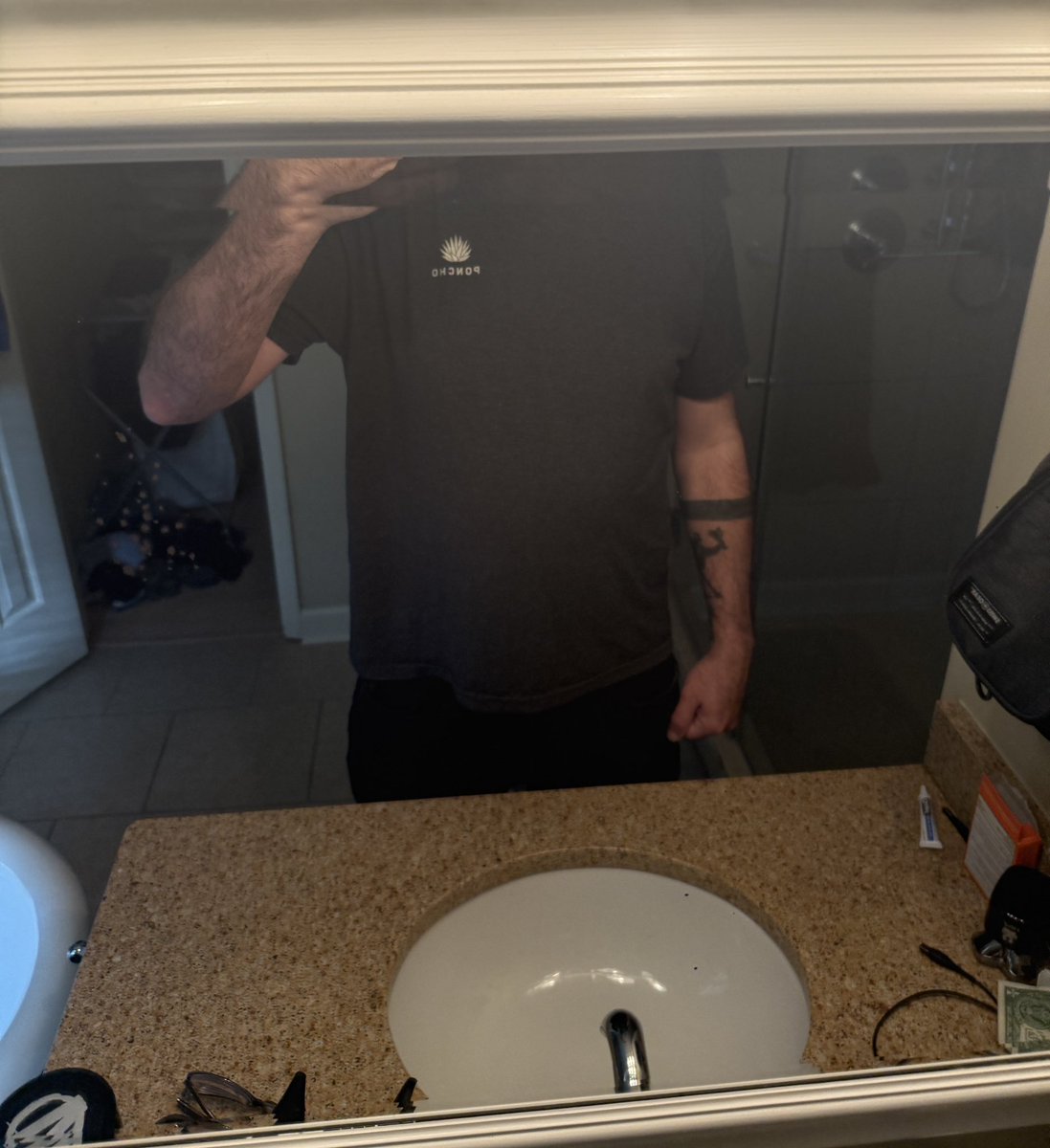 everyone wants to be tall but this is what it looks like trying to use the bathroom mirror