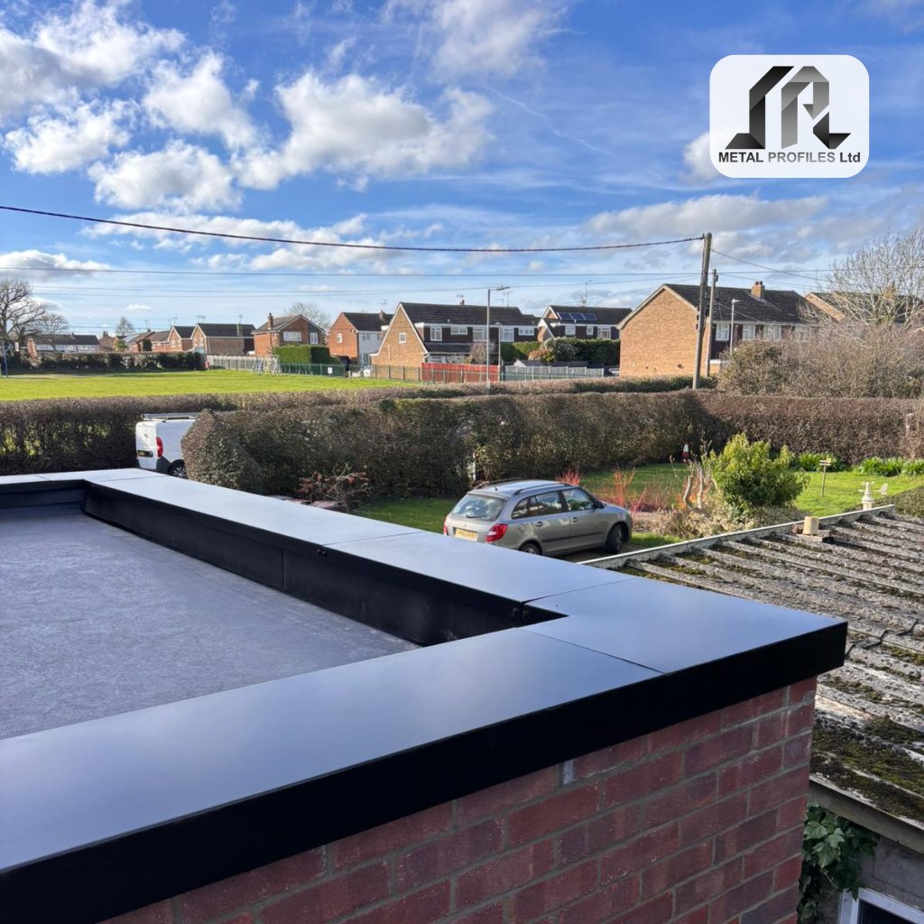 Clean lines make the difference.

RAL 9005 secret fix aluminium coping installed on a flat roof extension with rooflights.

Sharp corners. Consistent finish. Built properly.

#MetalProfilesLtd #AluminiumCoping #FlatRoof