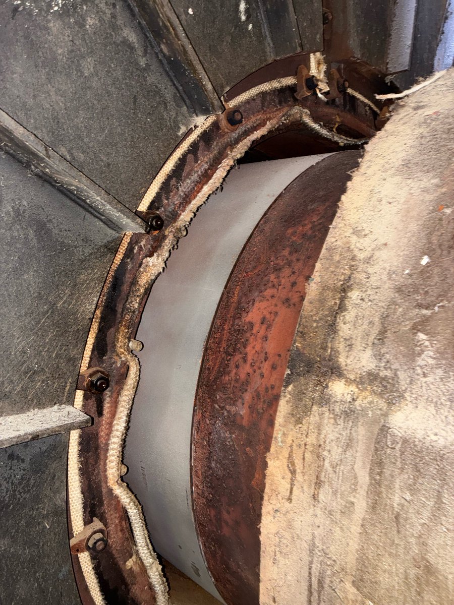 Some photos of us removing the burner housing to replace the rope gasket!