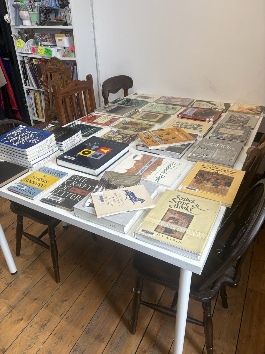 CreativeCallig's tweet photo. The calligraphy cupboard shelves are bulging with new books thanks to the International Research Centre for Calligraphy at @sunderlanduni - fortunately I have three calligraphy groups to share these donations with! 📚 

https://t.co/09U7G4Rj2f https://t.co/Qm8smKCrSw