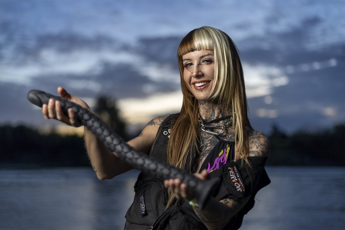 DarkMatterFoto's tweet photo. You know those weird dating app profiles from men where they are proudly holding some fish they caught? Well, we went down to the river and @lacie_venom did her own version... https://t.co/yZJt4oJ4TW