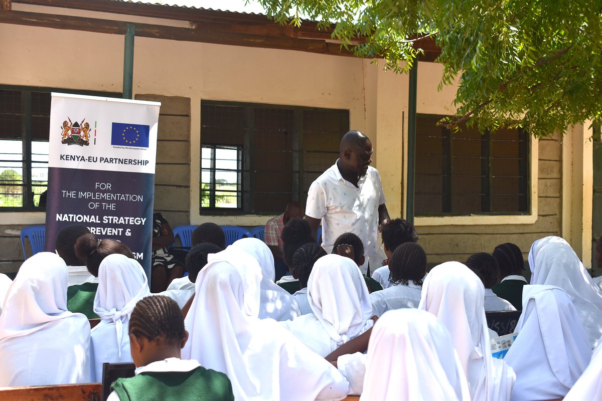 NCTC_Kenya's tweet photo. In Tana River County, at Madogo Senior School and Mororo High School, conversations went beyond the classroom into awareness, courage and choice.

Led by @NCTC_Kenya, the sessions opened up real talk on staying alert, recognising suspicious behaviour, and navigating the risks of online recruitment and radicalisation.

There was reflection on responsibility, unity across faiths, and the role each student plays in looking out for the other.

From run, hide, fight…
to see something, say something…One message stood out,
they understand their role, and they are ready to protect it.

#NSPCVE #TuweTayariKuilinda #StayVigilant

@Tanariver004 @KECOSCE @EduMinKenya @EUinKenya