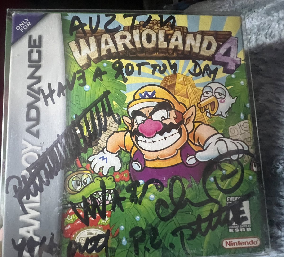 PlayerOneAustin's tweet photo. @gamestop I asked if he could sign my copy of Wario Land 4, and as Charles was signing it, he read it in Wario’s voice! *0* https://t.co/riLipvh8w5