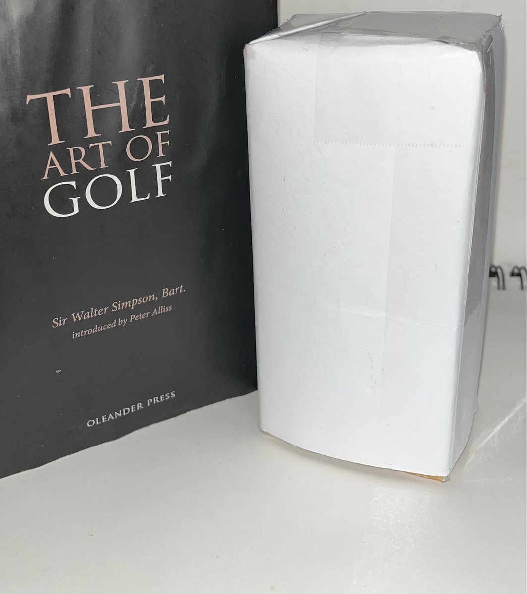 lightninggolf's tweet photo. Ladies and gentlemen, inside this small wrapped box is Hogan’s secret.

The box is sitting next to one of the great books about the greatest of all games!

I had this little white box with me in my luggage when I traveled to El Salvador in January for the Max and Stacy Golf Invitational.

While I was there, I unexpectedly got on stage with Max Keiser to talk about a training tool that I developed. The contents of this little white box will make the training tool I demonstrated even more effective!

If I had more time to prepare, I could have pulled this little box out and used it as a prop for a structured presentation. The title of that presentation is, “How Can You Cure Your Ailing Golf Game with 9 Beverage Napkins, a Pen, and a Phone?” It's a silly little bar trick of sorts. And ...It is quite an eye-opener!

When I walk you through the process, what is in that box will make complete sense to you.

The contents of this box are "a priori" to figuring out your golf swing.

As I now use AI to help me finish the book that has been burning inside me for the last 30 years, I want to give you a sneak peek of some of the concepts that I will be developing through the arc of the book. The book is titled, "Golf and the Golden Buffalo."

Tomorrow morning (April 1st, 2026) at 10:00 AM Eastern Standard Time, I will unveil what is in the box.

This is not an April Fools Day prank!

You may want to follow me and turn on notifications because I will be limiting the views to 50. Once the post reaches 50 views, I will delete it.

Stay tuned.