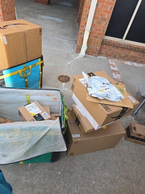 GregKamp's tweet photo. @amazon 2 products purchased. Notification of delivery on a curb. Driver says left with a receptionist OR in the lobby. @Amazon says they will replace items. Today photo of the lockers. Delivered no code to open. Prime member for years. Look at photos. https://t.co/EZ2RqfDohf