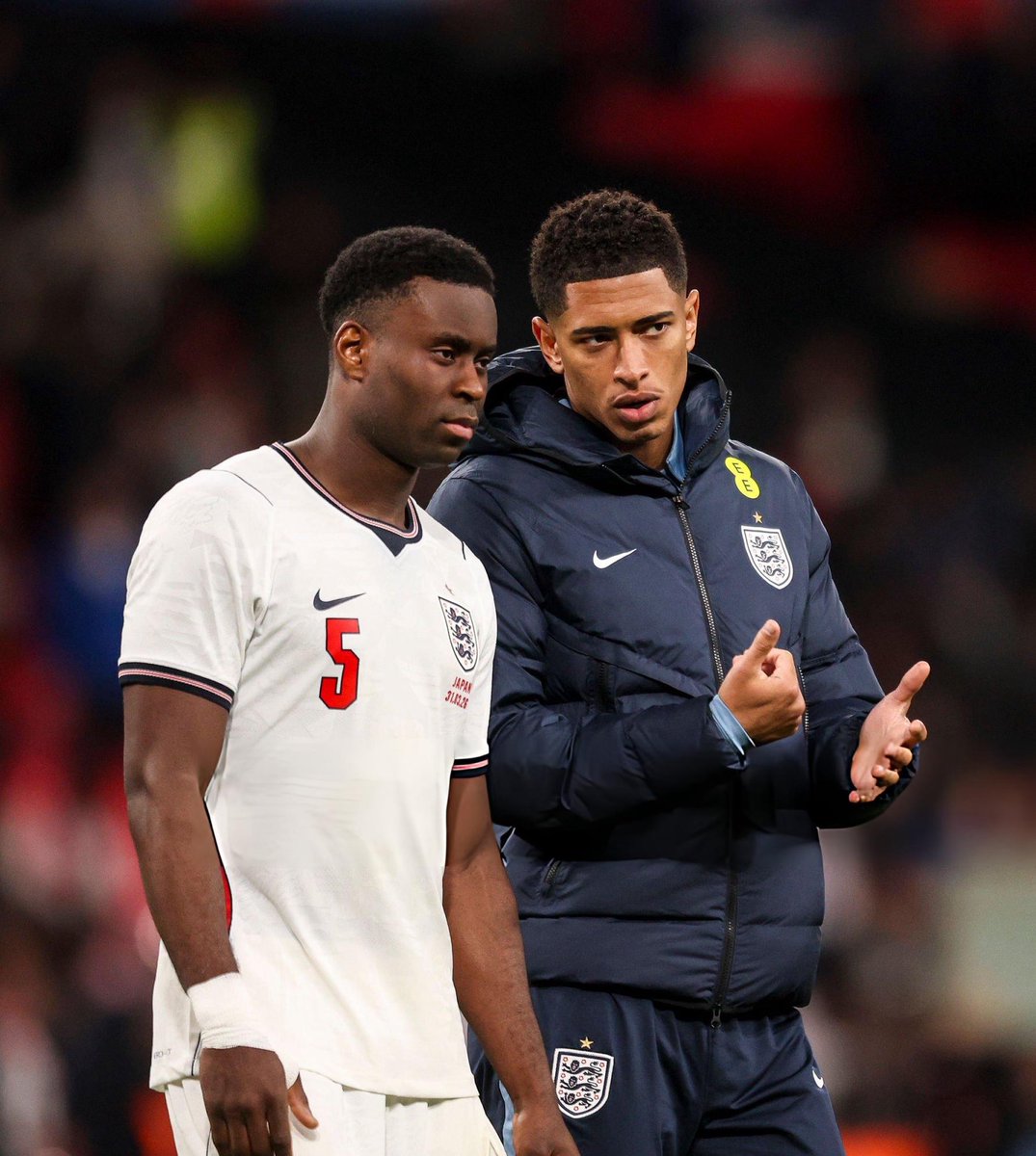 IHQJUDE's tweet photo. Jude Bellingham & Marc Guéhi after defeating England against Japan 🇯🇵 1 - 0 🏴 #ENGJPN #ThreeLions https://t.co/hKPo9lbycj