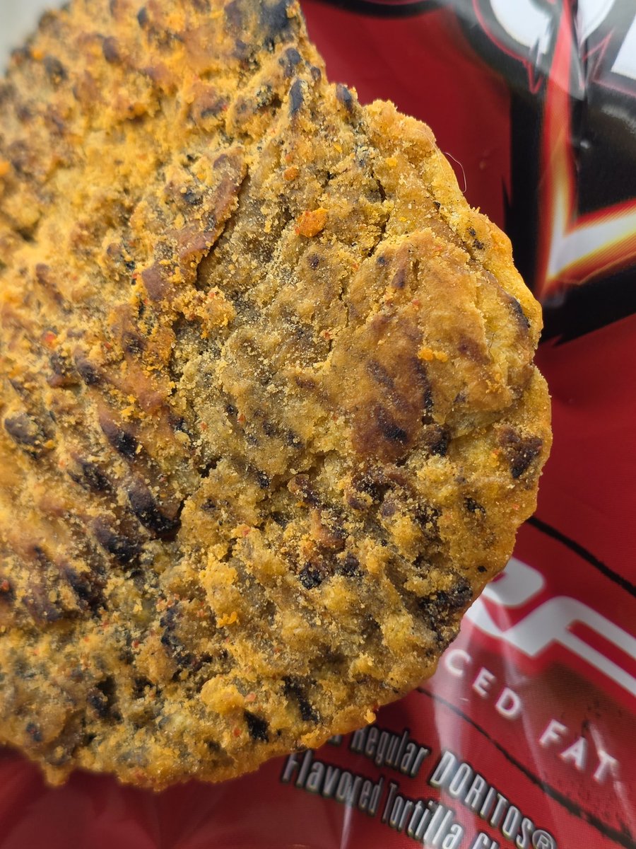 My daughter found this monstrosity in her Dorito bag today. 

It is thicker than a giant's toenail and surprisingly hefty.

My kids dared me to eat it.

I told them if this post gets 1,000,000 likes...

I will eat the whole thing, and post a video as proof that I kept my word.