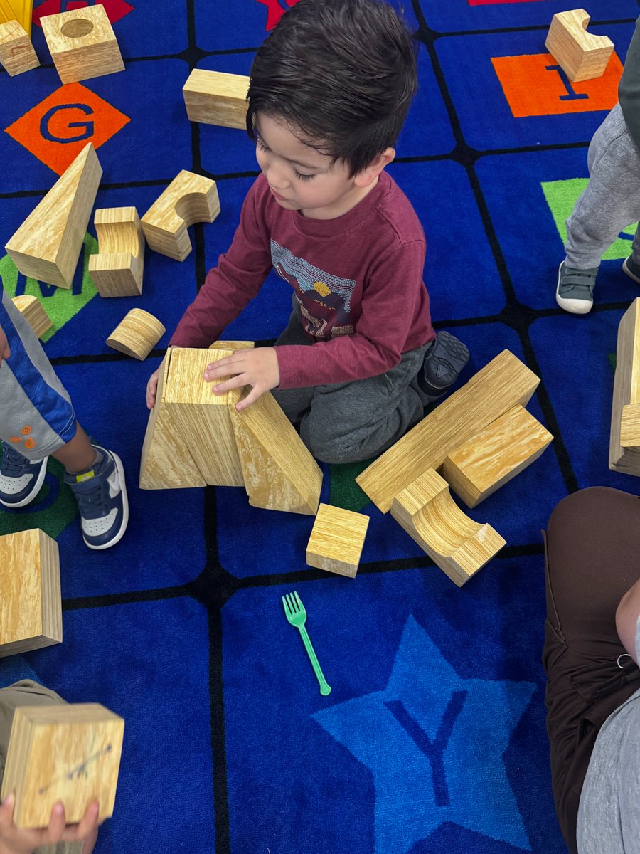 MsDickerson1st's tweet photo. Our toddlers at the RISD Family Center teamed up to build skyscrapers—exploring math and science concepts through play! From “over” and “under” to learning how to work side by side, these moments build both skills and connections. #WOYC26 @RISDecs  #RISDDreamBig @RISDFamCenter https://t.co/OYkfJtiEu3