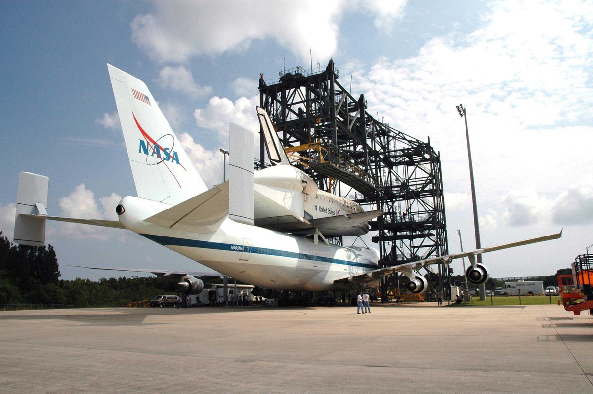 On #TDIH in 2012, Space Shuttle Discovery was lifted onto the top of NASA's Shuttle Carrier Aircraft (SCA) in the mate-demate device. The Shuttle was at <a href="/NASAKennedy/">NASA's Kennedy Space Center</a> in preparation for its flight to <a href="/Dulles_Airport/">Dulles Airport (IAD)</a> to go on display at our Udvar-Hazy Center.