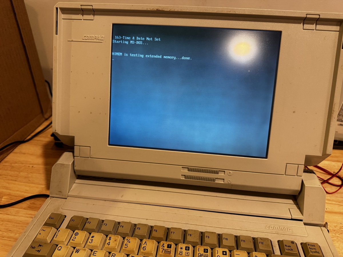 richinfante's tweet photo. Compaq SLT286. Power adapter’s long gone … but helpful internet people have found you can just Hotwire +12V across certain battery connector pins. Won’t boot with this version of DOS though, I think it has baked in cd rom drivers which this doesn’t like https://t.co/0AhxF74LMv
