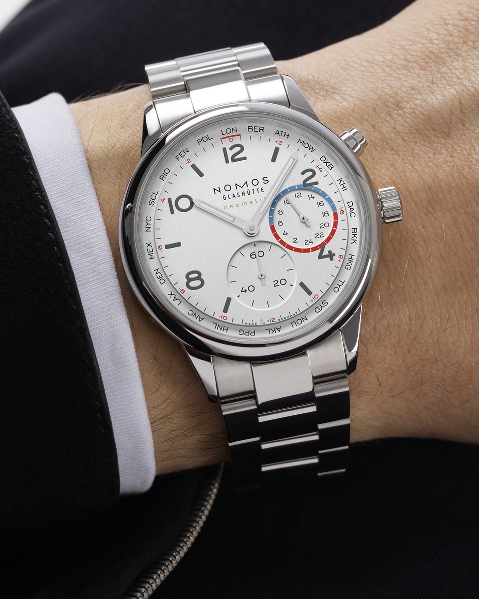 baldassarreted's tweet image. Following up 2025’s smash hit in the Club Sport Worldtimer, German watchmaker Nomos Glashutte adds a third reference to their core collection.

Joining the silver dial and the classic blue is a crisp white colorway. The watch is still powered by the brand’s in-house DUW3202
