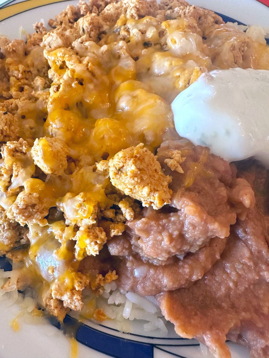 free_style_chef's tweet image. I love burrito bowls! 

Steamed rice, spicy mashed pinto beans, Cajun spiced sautéed crumbled tofu, melted cheese, and a jalapeño yogurt cream. 

#twittersupperclub #vegetarian