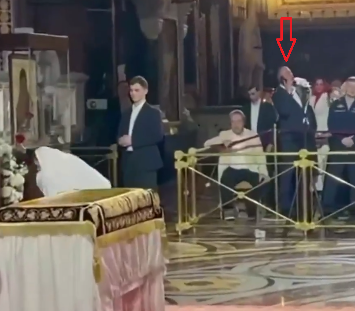 Distracting for Russian Orthodox worshippers when a man is standing near the front of the congregation, on a step, looking the wrong way and talking into his mobile phone. The Easter Liturgy should transport us back to Gethsemane, Via Dolorosa and Golgotha.