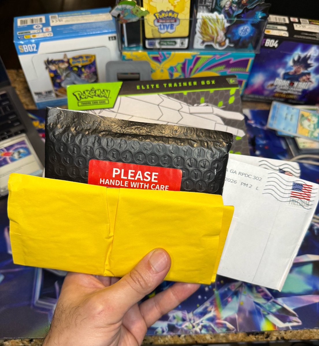 WrenchPullsTCG's tweet image. No better feeling than getting home, seeing my family, and realizing it’s Mail Day! 

These beauties are going to my master set. I really like these box toppers. I think over time it will do well.🛠️
#mailday #collector #collectibles #pokemon #dragonball
