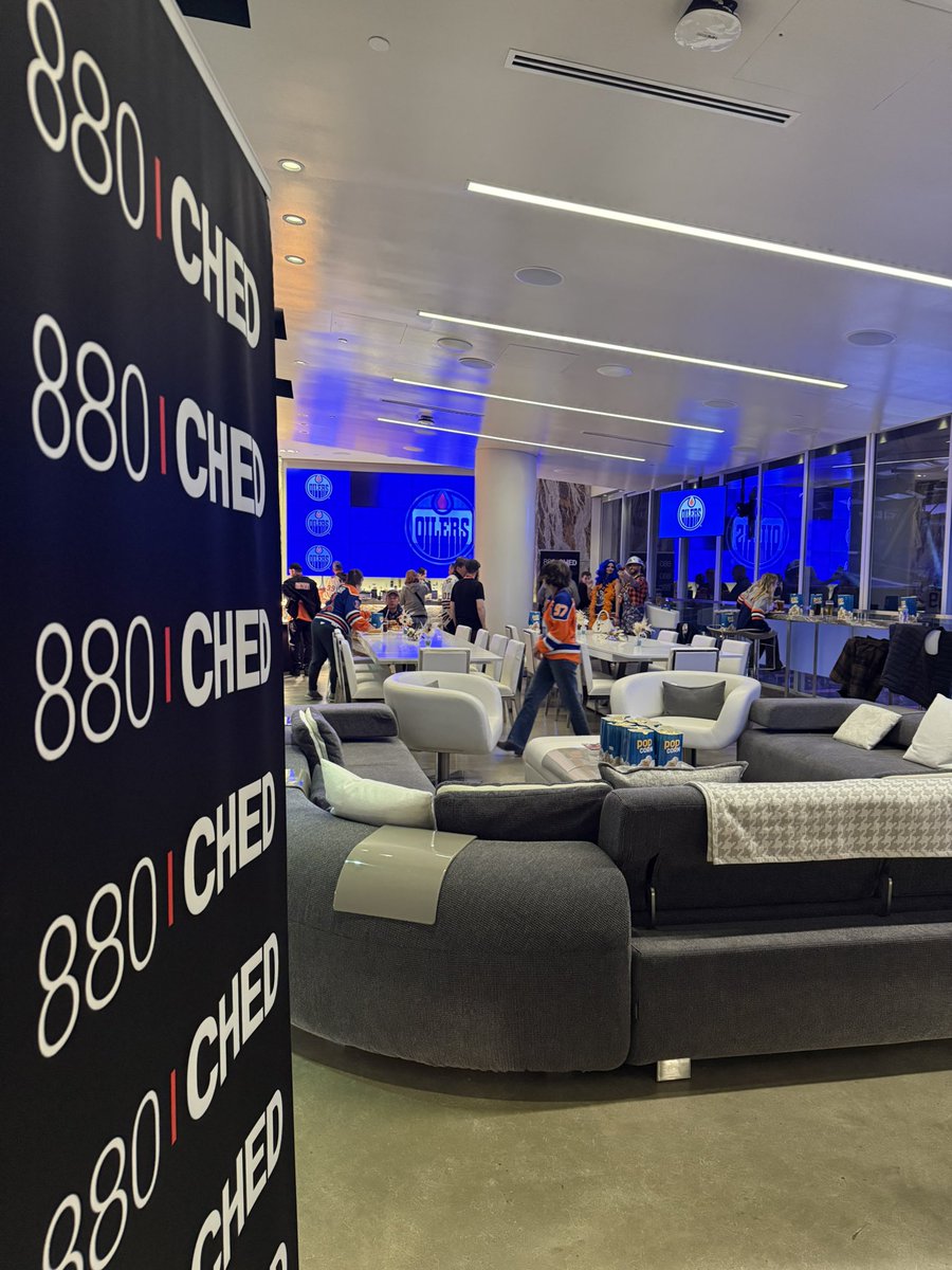 staceybrotzel's tweet image. Hanging with cool @CHED880 listeners feeling underdressed. They were among the winners who are watching the @EdmontonOilers game in the Summit suite. #yeg