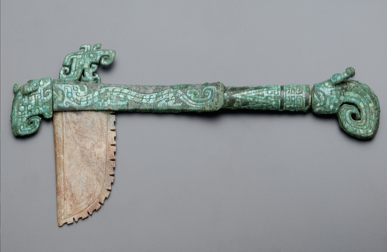 A Hafted Axe with Dragons from Ancient China, dating back to approximately 1300–1200 B.C.E. during the late Shang dynasty.