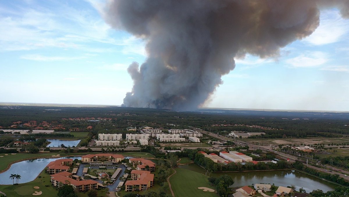 Drone view from our hood—~5 miles west of the Picayune Strand fire. Inland blaze + westward winds = smoke our way. Happens every year 🔥 #Florida #Wildfire #NaplesFL #GulfCoast #Smoke #Weather