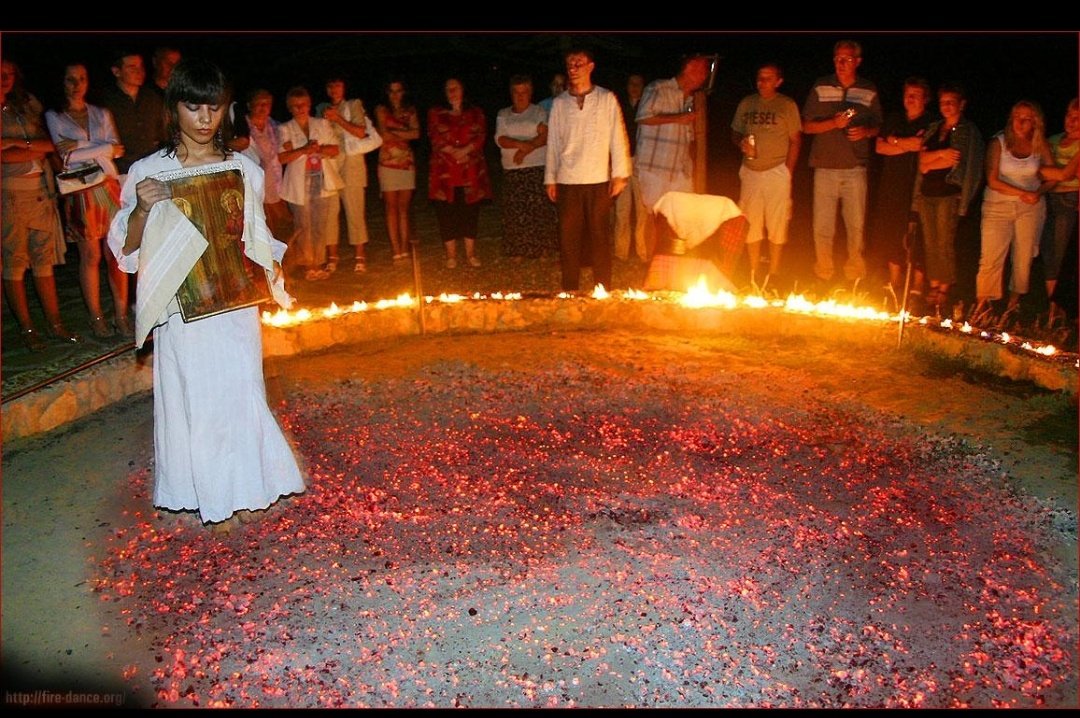 Fire-walking tradition in northern Greece

Devotion to Christian saints ! 

Such folk rituals exist in almost all over the world.