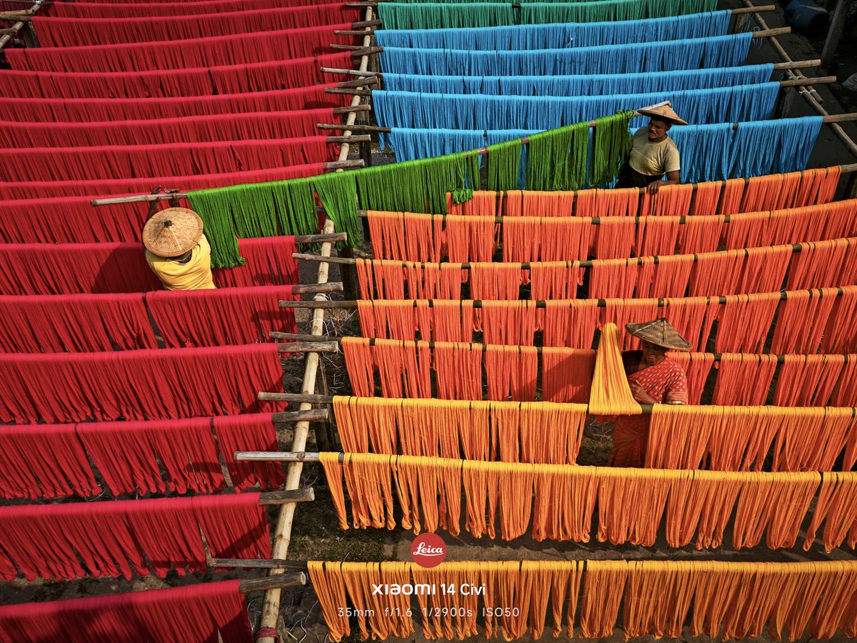 9thdec's tweet photo. Threads of Shakti”
Amid rows of hand-dyed threads drying under the open sky, the face of Goddess Durga quietly emerges—symbolizing the inseparable bond between devotion and daily labor in Bengal. 
@pixelwithme
@XiaomiIndia 
#XiaomiImageryGlobalAwards2026
@XiaomiGdeals https://t.co/AinstMsQzK