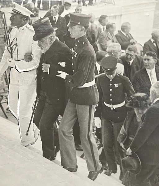 May 1922: 78-year-old Robert T Lincoln, son of Abraham Lincoln, is helped up the steps at the dedication of the Lincoln Memorial in Washington D. C.