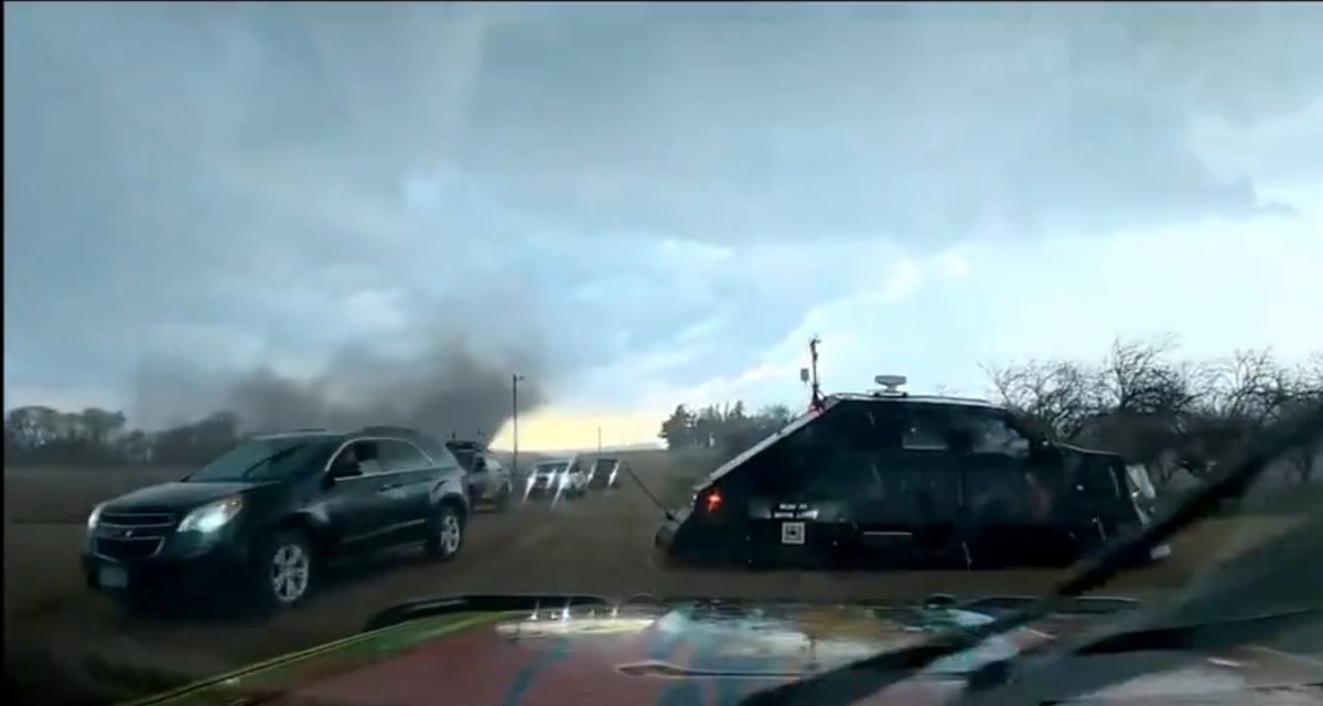 MelissaJNeal's tweet photo. @ReedTimmerUSA You parked the Dominator at an intersection causing one lane of traffic trying to move away from the tornado. https://t.co/KauhpCpNuQ