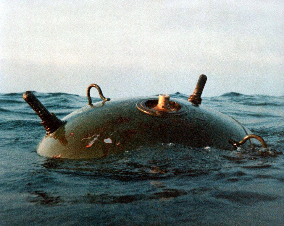 eodauthor's tweet photo. On this day, April 14, 1988, USS Samuel B. Roberts was transiting the Persian Gulf when the forward lookout spotted something on the surface…a dark, black orb with horns. Then he spotted another. Then a third.
Mines.
The Officer of the Deck immediately ordered “All stop” and called Captain Paul Rinn to the bridge. Within moments, the ship was at general quarters—but with a critical twist: sailors in engineering spaces were ordered topside, away from the danger below.
Rinn then made a calculated move—backing the ship out along its own wake, the safest path he had.
Unfortunately, Roberts backed over a mine that detonated beneath the ship, ripping a 22-foot hole in the engine room.
What followed was a herculean fight for survival—firefighting, flooding control, and lifesaving efforts carried out under extreme conditions.
No sailors were lost.
The mine that struck Roberts cost roughly $2,000.
The damage? $93 million—and nearly the ship itself.
Mine warfare, guerre de mine, remains an effective naval strategy. Mines are a means for a small sea power to thwart a strong sea power state.
If you want to learn more about the Roberts mine strike, take a deeper look in A Poisoned Chalice: The U.S. Navy in the Persian Gulf, 1987–1988 (Potomac Books).
Now available at 40% off with the code in the attached image with additional information about the book.