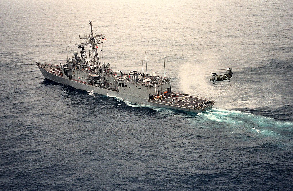 eodauthor's tweet photo. On this day, April 14, 1988, USS Samuel B. Roberts was transiting the Persian Gulf when the forward lookout spotted something on the surface…a dark, black orb with horns. Then he spotted another. Then a third.
Mines.
The Officer of the Deck immediately ordered “All stop” and called Captain Paul Rinn to the bridge. Within moments, the ship was at general quarters—but with a critical twist: sailors in engineering spaces were ordered topside, away from the danger below.
Rinn then made a calculated move—backing the ship out along its own wake, the safest path he had.
Unfortunately, Roberts backed over a mine that detonated beneath the ship, ripping a 22-foot hole in the engine room.
What followed was a herculean fight for survival—firefighting, flooding control, and lifesaving efforts carried out under extreme conditions.
No sailors were lost.
The mine that struck Roberts cost roughly $2,000.
The damage? $93 million—and nearly the ship itself.
Mine warfare, guerre de mine, remains an effective naval strategy. Mines are a means for a small sea power to thwart a strong sea power state.
If you want to learn more about the Roberts mine strike, take a deeper look in A Poisoned Chalice: The U.S. Navy in the Persian Gulf, 1987–1988 (Potomac Books).
Now available at 40% off with the code in the attached image with additional information about the book.