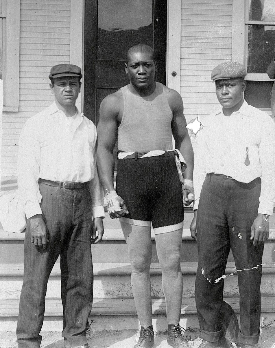HVYWeightHeroes's tweet image. World champ Jack Johnson, aka "The Galveston Giant," poses for a photo at his training camp before his big 1910 showdown against former champ James J. Jeffries in Reno, Nevada. Johnson would dominate Jeffries and win by 15th round TKO. #Heavyweight #History #Boxing