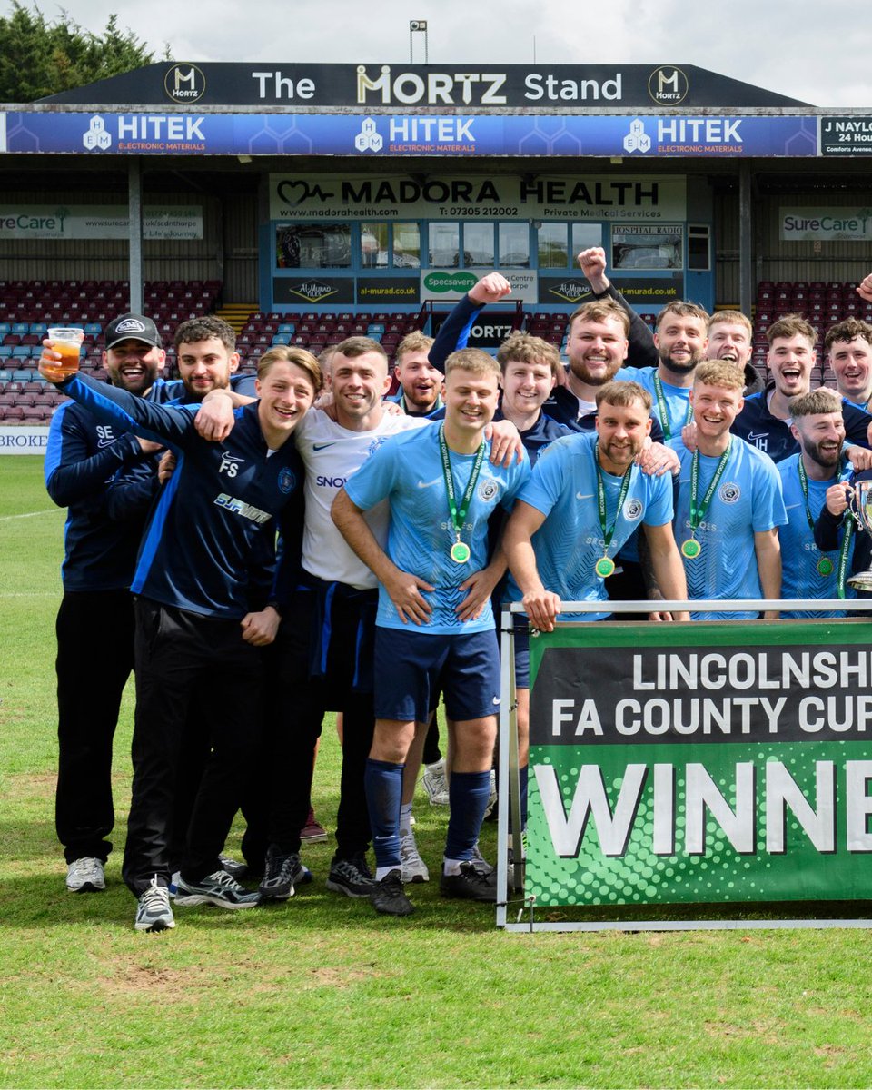 LincolnshireFA's tweet photo. 🏆 Ashby FC lift the County Sunday Cup!

⚽ A composed 3-1 victory over Ruston United saw Ashby FC secure the trophy, with a dominant first-half performance proving decisive in a well-controlled final.

📸 Relive an unforgettable Sunday by visiting https://t.co/qjk64PLrLR to explore the exclusive photo gallery, read the full match report and access the digital programme