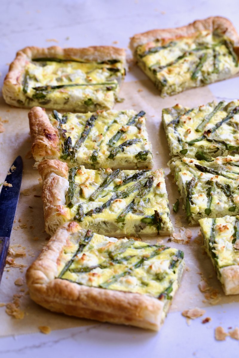 chefcarolb's tweet photo. Puff Pastry Vegetable Tart with asparagus and artichokes baked on a sheet pan is an easy way to feed a group!  Purchased puff pastry makes the crust effortless and the three-cheese blend makes it extraordinary! https://t.co/7ZcXDszwgf via @chefcarolb https://t.co/elgd6yP9G3