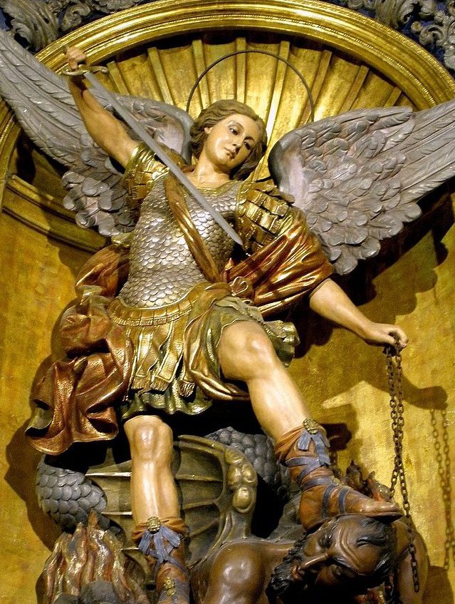 San Miguel Arcángel, defiéndenos en la batalla.
Sé nuestro amparo contra la perversidad y acechanzas del demonio.
Que Dios manifieste sobre él su poder, es nuestra humilde súplica. 
Y tú, oh Príncipe de la Milicia Celestial, con el poder que Dios te ha conferido, arroja al
