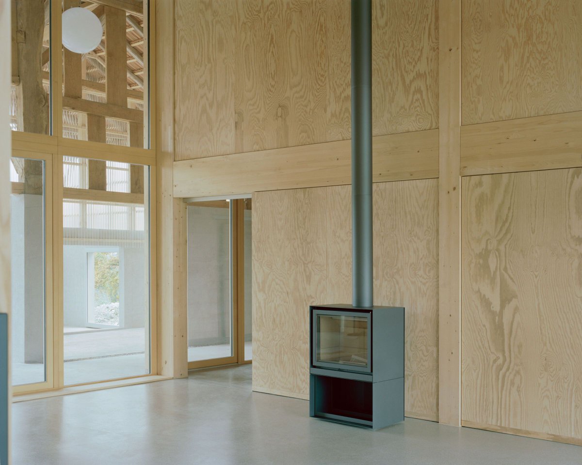 Archello's tweet photo. The farmhouse transformation by BARD YERSIN architectes inserts a timber-framed dwelling within the existing shell, using terracotta brick cores and glazed partitions to structure space. 
https://t.co/0gWHtKoDmN 

#AdaptiveReuse #TimberStructure #PermacultureDesign https://t.co/QiIWhLBToe