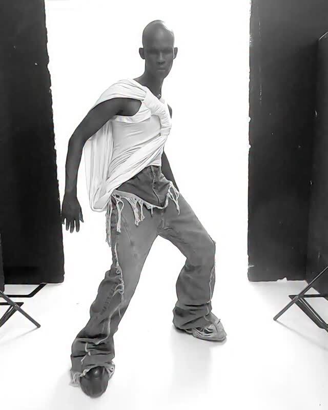 OMAR, SS26 TEMPLE HARNESS TANK IN GOTS CERTIFIED ORGANIC COTTON AND SLIVERED BOOTCUT IN SHREDDED 13OZ JAPANESE DENIM, AVAILABLE ONLINE NOW #RICKOWENS #RICKOWENSONLINE #RICKOWENSSS26 instagr.am/p/DXHVpW2jOQb/