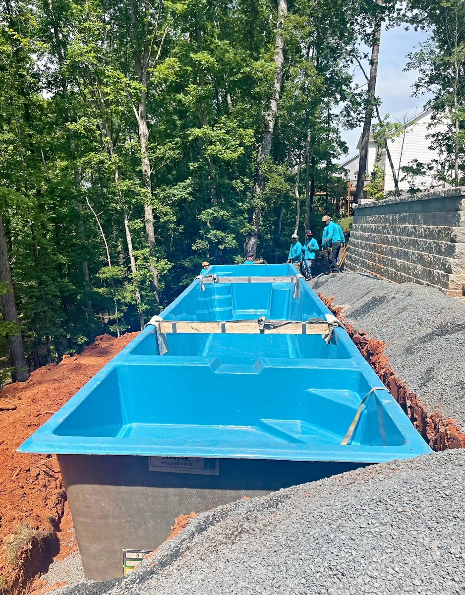 They say life is a marathon and not a sprint.  Hey, we get it!  The installation of the 8’6” x 40’0” Marathon with spa fiberglass pool model. #pool #constructionlife