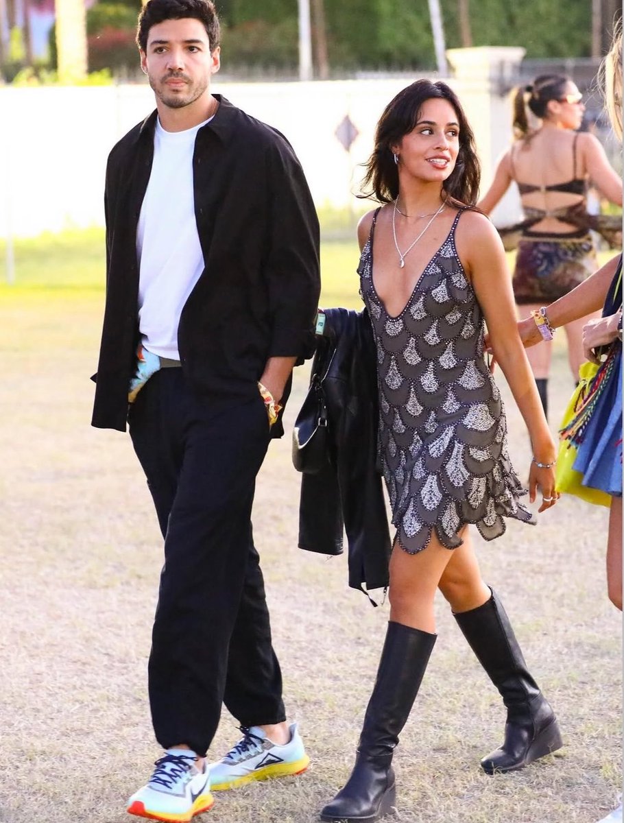 kcccloset's tweet photo. Camila Cabello with boyfriend at Coachella Night 2 🩵  

POUBEL Azure Mini Charm Bracelet | USD 515.00

VAGABOND Deena Tall Boots | USD 300.00

04.11.2026 https://t.co/iwumh5Q7XR