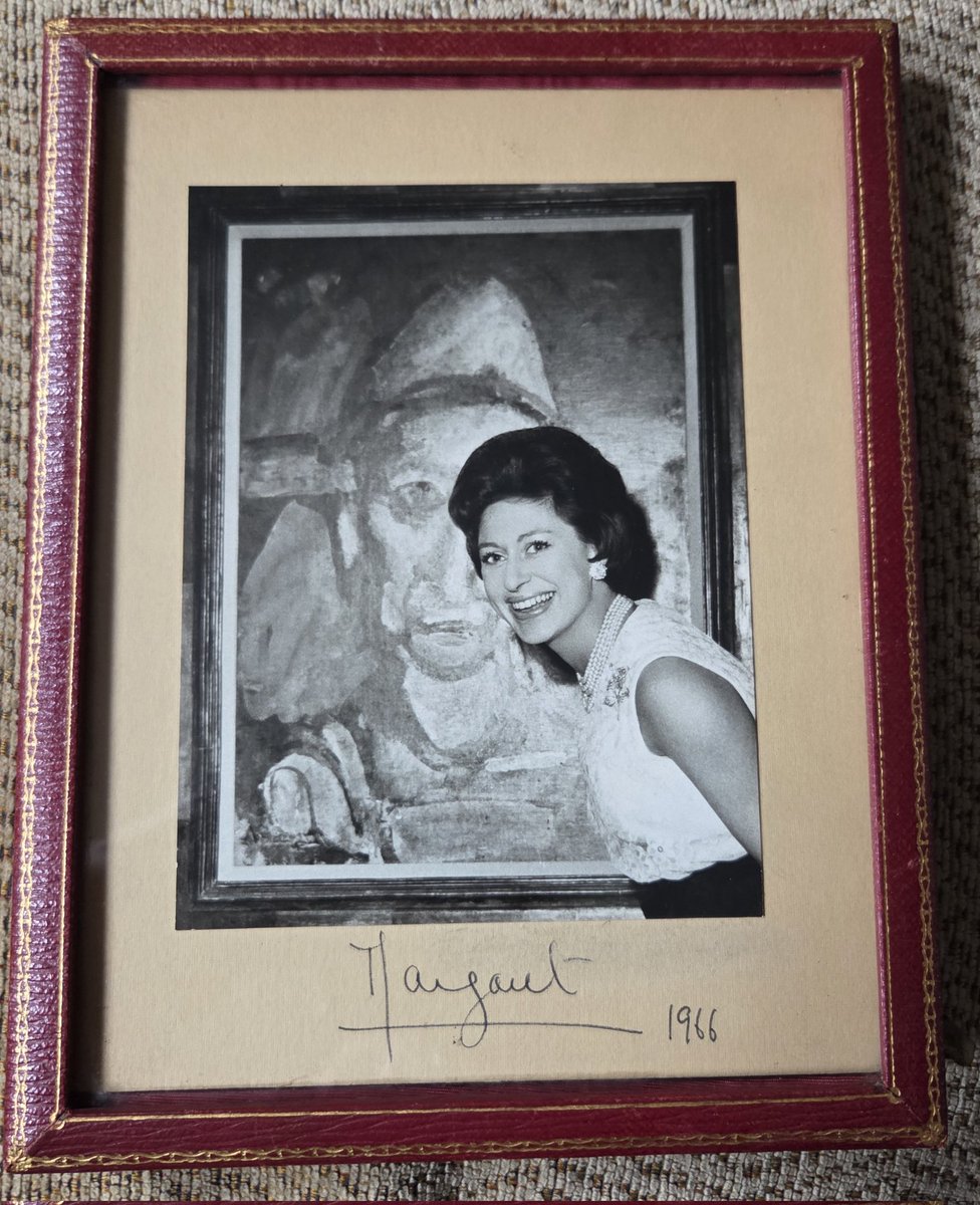 A hand signed mounted portrait of HRH Princess Margaret, Countess of Snowdon, Sister to HM Queen Elizabeth II, in a red Smythson of Bond Street leather presentation frame – the Royal photograph taken by her husband, Lord Snowdon.