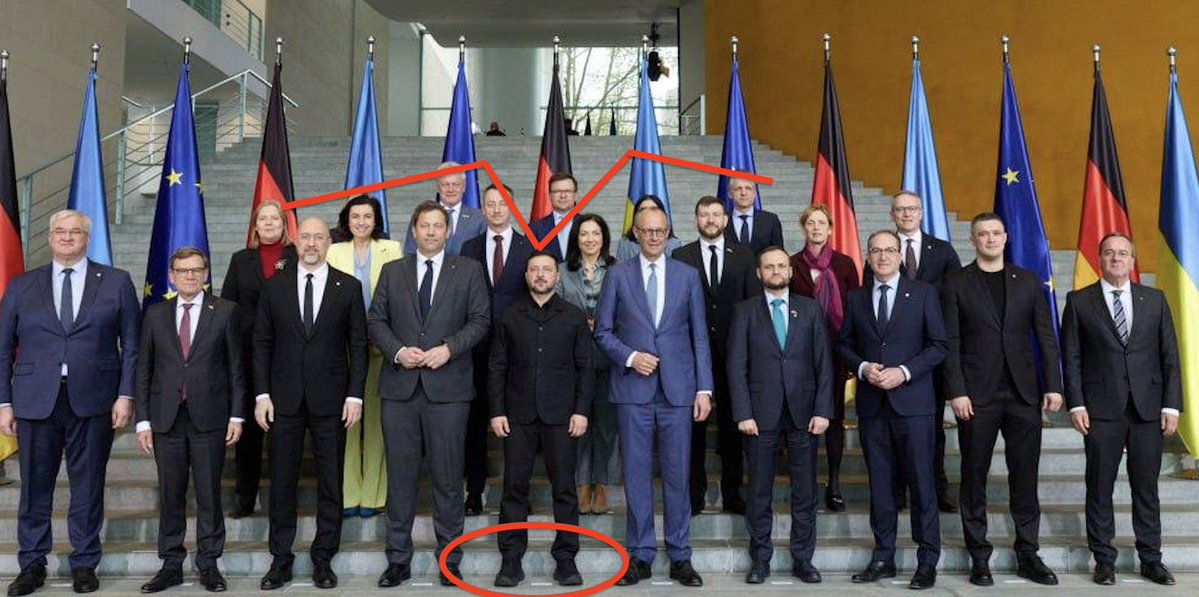 Karmabash's tweet image. Note, Zelensky is standing on 5-inch platform soles: