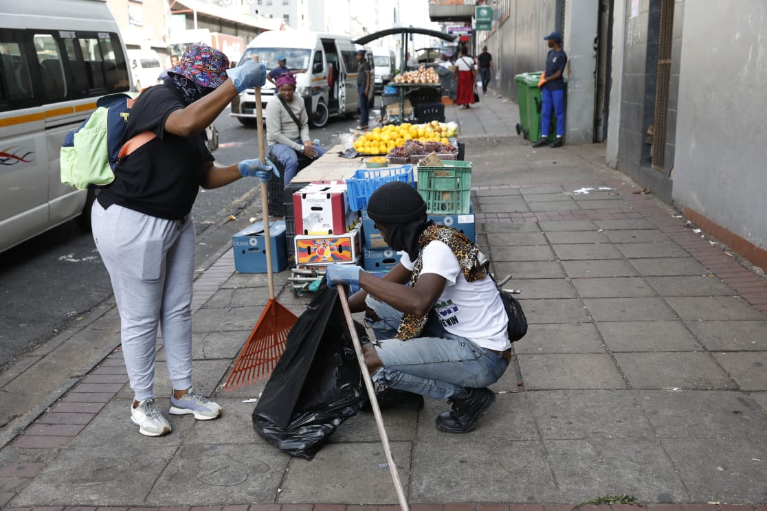 IOL's tweet image. Members of March and March embarked on a cleanup campaign in Durban’s CBD on Tuesday morning, clearing rubbish from pavements, streets, outside shops, and tables along the sidewalks.  
#MarchandMarch #Durban #CleanUp 
Pictures: Doctor Ngcobo / Independent Newspapers
