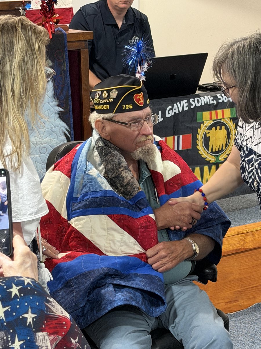 walkerforAL's tweet photo. On the road with the Walkers! 🚗💨 Honored to attend the Quilts of Valor ceremony for Vietnam vet Sgt. Major Thomas McClaughey 🇺🇸. Let’s support our veterans! Vote for Rodney Walker on May 19! #Veterans #QuiltsofValor #Vote2026 https://t.co/6hiA8QkgCT