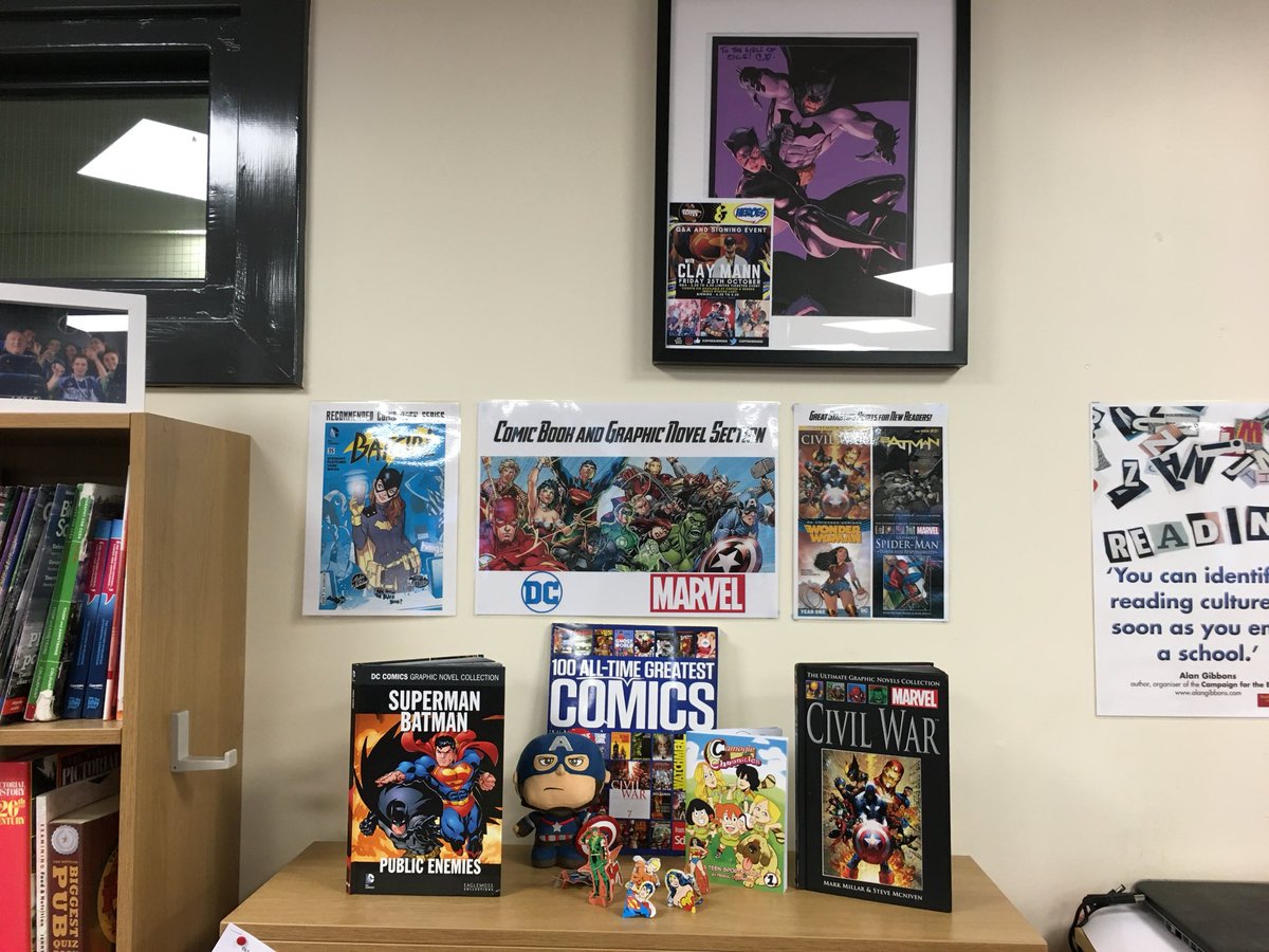 OLSComicClub's tweet photo. 💥 We were delighted to unveil a very special piece of art- a framed picture from @StockmanNate with the message “To the girls of OLS- CHEERS!” 

This picture will go pride of place in the Comic Book section of our Library, beside the great Batman art from @Clay_Mann_ @TomKingTK https://t.co/ouNrTTgev0
